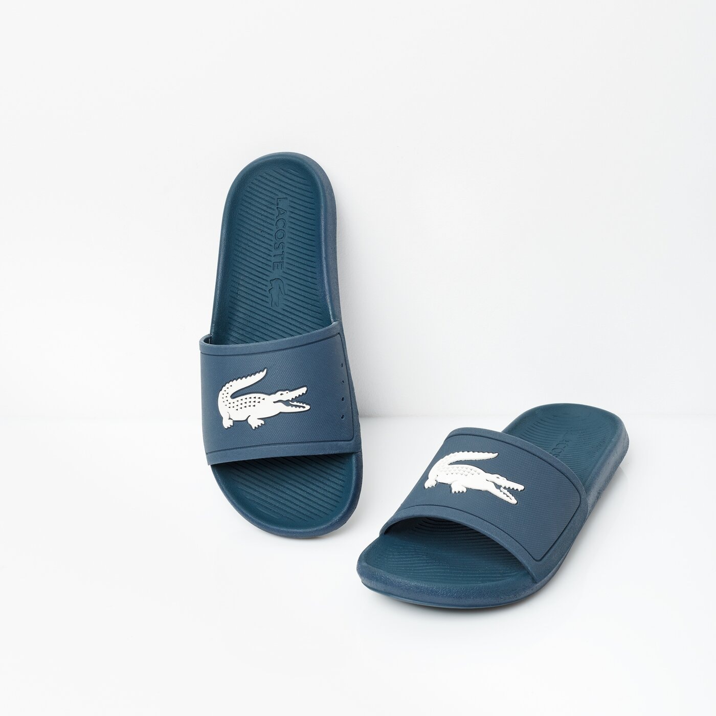 Męskie klapki LACOSTE CROCO SLIDE 219 1 CMA 737cma00222m8 kolor niebieski