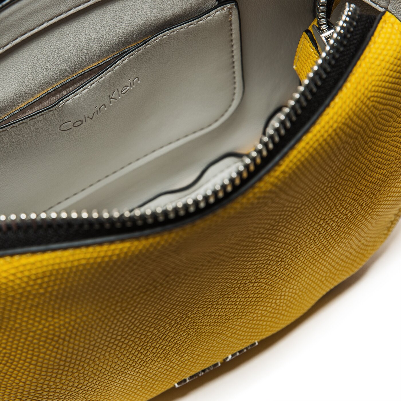 CALVIN KLEIN TORBA ARCH SMALL SADDLE BAG LIZ k60k604175703 kolor żółty
