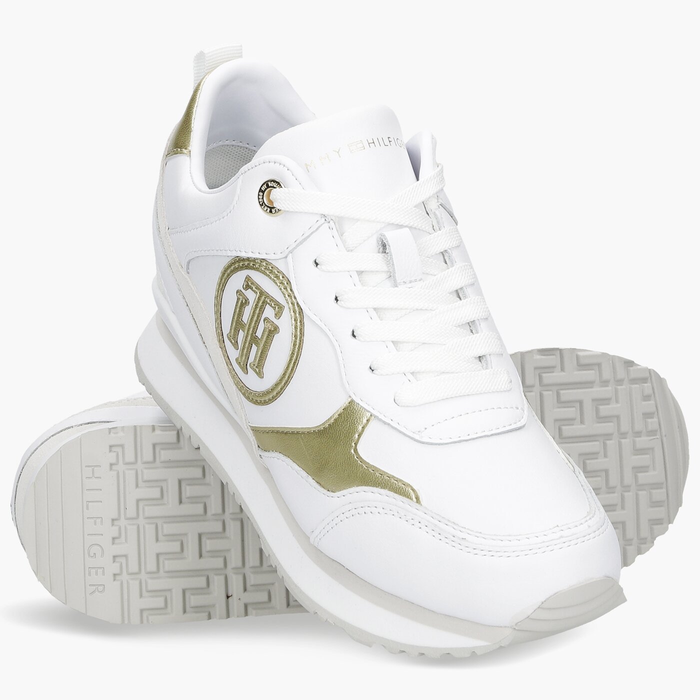 Damskie sneakersy (buty) TOMMY HILFIGER METALLIC DRESSY WEDGE SNEAKER fw0fw05801ybr kolor biały