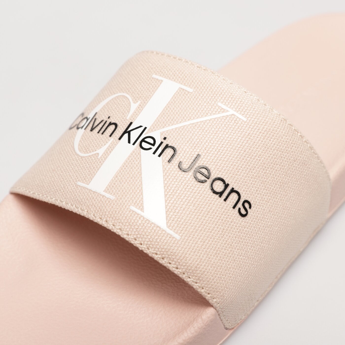 Damskie klapki CALVIN KLEIN SLIDE MONOGRAM CO yw0yw001030jw kolor beżowy