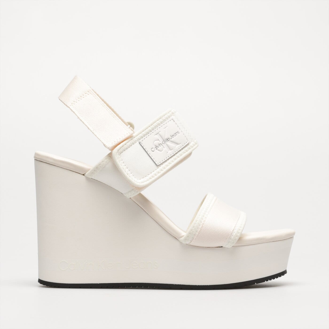 Damskie szpilki / czółenka CALVIN KLEIN WEDGE SANDAL BADGE yw0yw010280la kolor biały
